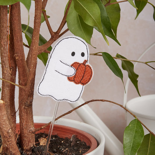 Pique-plante fantôme avec citrouille